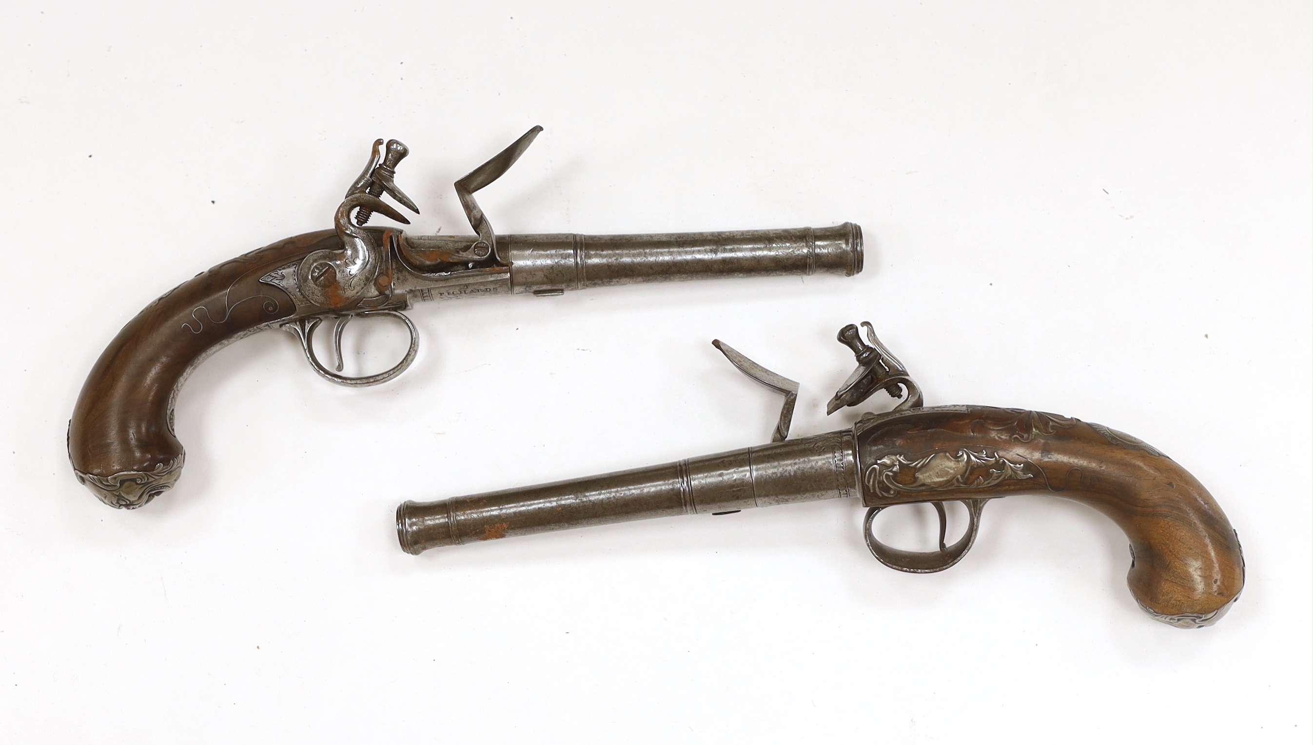 A pair of Queen Anne cannon barrel side hammer flintlock holster pistols by T. Richards, c.1770